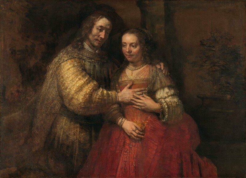 ISAAK EN REBEKKA, BEKEND ALS ‘HET JOODSE BRUIDJE’ Uit de serie Honderd Meesterwerken Isaak en Rebekka, bekend als ‘Het Joodse bruidje’, Rembrandt van Rijn, ca. 1665 - ca. 1669 Zie de blikken en de tedere manier waarop de handen elkaar raken. Opmerkelijk is het contrast tussen de subtiele stemming en de gedurfde manier waarop Rembrandt de kleding schilderde.